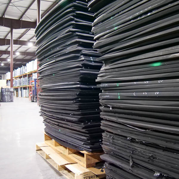 stacks of foam sheets in warehouse